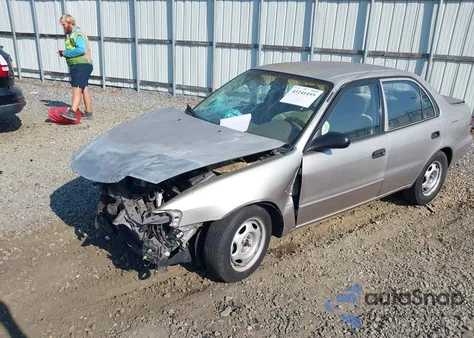 2001 Toyota Corolla Ce из США, поврежденный, VIN 1NXBR12E01Z561124